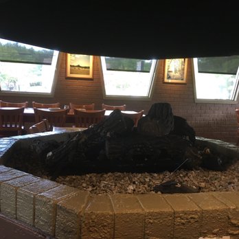 Pizza Hut - a fire pit in the middle of a restaurant - Pizza Near Me - Rosedale, Maryland
