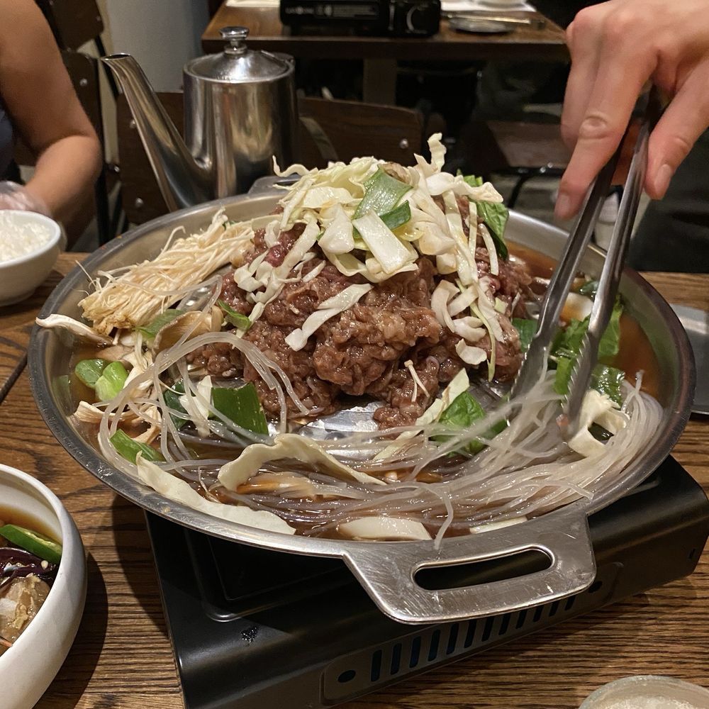 Sam Woo Jung - Waiter cooking the bulgogi - Korean Near Me - New York, New York Sam Woo Jung - Waiter cooking the bulgogi - Korean Near Me - New York, New York