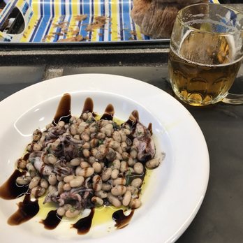 Pinotxo Bar - Squid with beans. - Spanish Near Me - Barcelona, B Pinotxo Bar - Squid with beans. - Spanish Near Me - Barcelona, B
