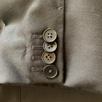 Robert's Men Suits & Custom Tailoring - Two middle buttons not sewn in an X. Spacing is also off so they do not layer properly. Extra two stitches on the left. - Sewing & Alterations Near Me - San Diego, California