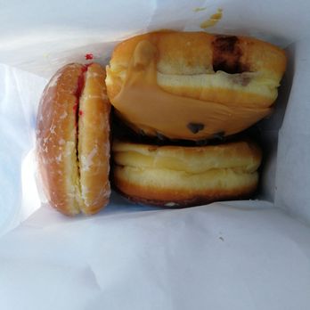 Donut Town - Raspberry, chocolate chip with maple glaze with chocolate in the middle, chocolate glaze with creme in the middle. Delicious!!!!!! - Donuts Near Me - Ceres, California