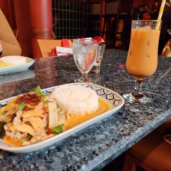 Bangkok Garden Restaurant - Red curry with chicken with the Thai Iced Tea on the right side - Thai Near Me - Toronto, Ontario Bangkok Garden Restaurant - Red curry with chicken with the Thai Iced Tea on the right side - Thai Near Me - Toronto, Ontario