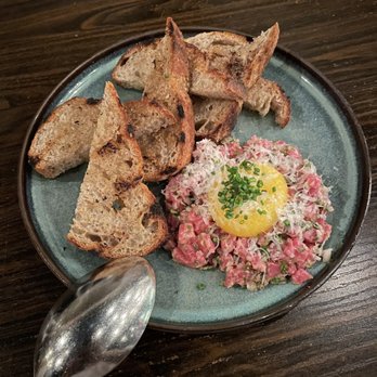 Sparrow + Wolf - Grass feed beef tartare with grilled sourdough - New American Near Me - Las Vegas, Nevada Sparrow + Wolf - Grass feed beef tartare with grilled sourdough - New American Near Me - Las Vegas, Nevada