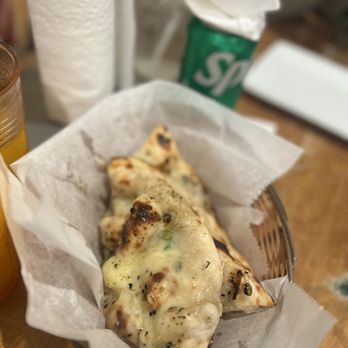 Plume Algiers - Garlic, Chili, Cheese Naan - Indian Near Me - New Orleans, Louisiana Plume Algiers - Garlic, Chili, Cheese Naan - Indian Near Me - New Orleans, Louisiana