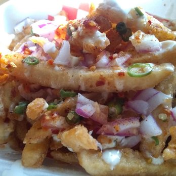 Krave Pizza & Wings - a close up of a plate of fries - Pizza Near Me - Oshawa, Ontario Krave Pizza & Wings - a close up of a plate of fries - Pizza Near Me - Oshawa, Ontario