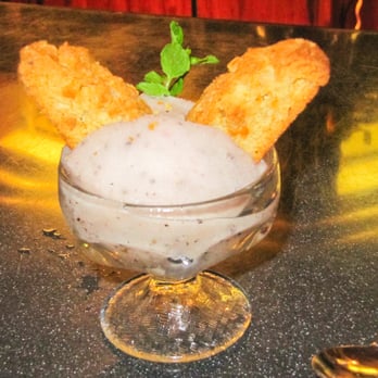 Hukilau Lanai - Dragonfruit Sorbet w/ Biscotti (we broke the biscotti in 1/2 so it looks better). - Seafood Near Me - Kapaa, Hawaii