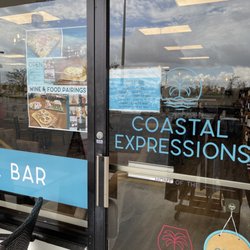 Coastal Expressions Wine Bar  - Door signage and daily hours