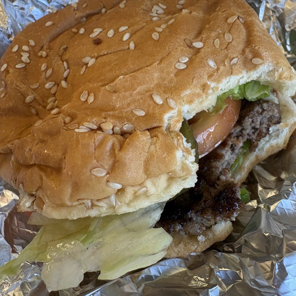 Five Guys - Burger with a bite out of. I - Fast Food Near Me - Rensselaer, New York Five Guys - Burger with a bite out of. I - Fast Food Near Me - Rensselaer, New York