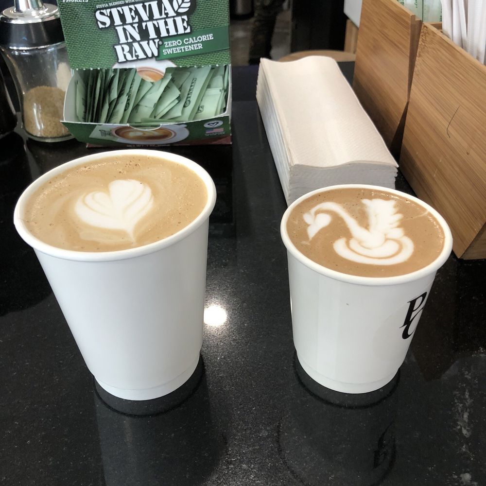 Vanilla latte (left), Mocha (right). Look at that swan art!!