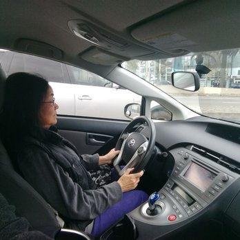 Auto Deal - Wide angle of the cockpit of the 2014 Prius plug-in. - Car Dealers Near Me - Sunnyvale, California