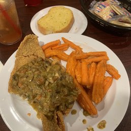 Catfish wit crawfish sauce and sweet potato fries, delicious!
