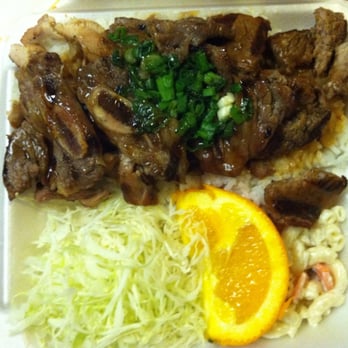 Teriyakin' - The Works! plate (chicken, steak, and bone-in short ribs, cabbage, rice, "Japanese" macaroni salad, orange) - Japanese Near Me - Morrisville, North Carolina