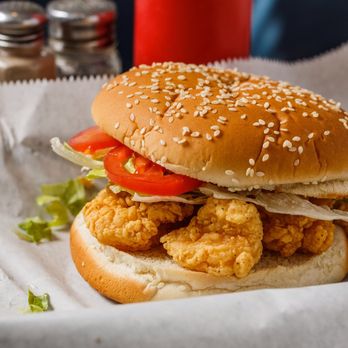 Denham Patty - a chicken sandwich with lettuce and tomatoes - American Near Me - Denham Springs, Louisiana