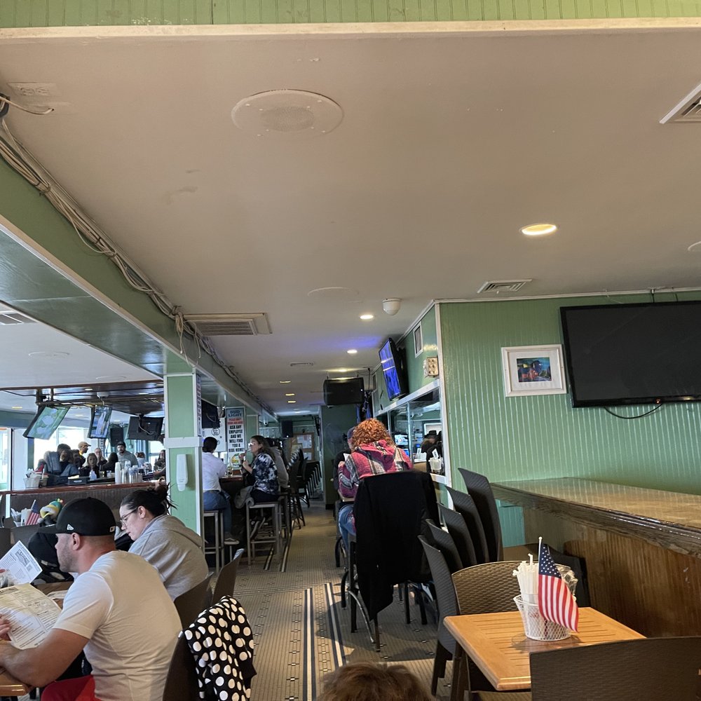 Jr's Ocean Bar and Grill - people sitting at tables - Cheesesteaks Near Me - Seaside Heights, New Jersey Jr's Ocean Bar and Grill - people sitting at tables - Cheesesteaks Near Me - Seaside Heights, New Jersey