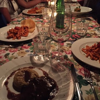 Al Garghet - Braised beef with polenta on bottom. Nephenta on the left and right. - Lumbard Near Me - Milan, Michigan