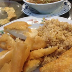 Golden Palace - Golden palace chicken with sauce on the side.