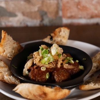 The Saddle - BBQ Meatballs-Caramelized onion, homemade BBQ sauce, green and crispy onion, grilled toast points - Salad Near Me - Tucson, Arizona The Saddle - BBQ Meatballs-Caramelized onion, homemade BBQ sauce, green and crispy onion, grilled toast points - Salad Near Me - Tucson, Arizona