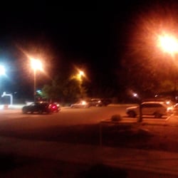 It has a private parking lot, but if it's busy you can also park alongside the street.