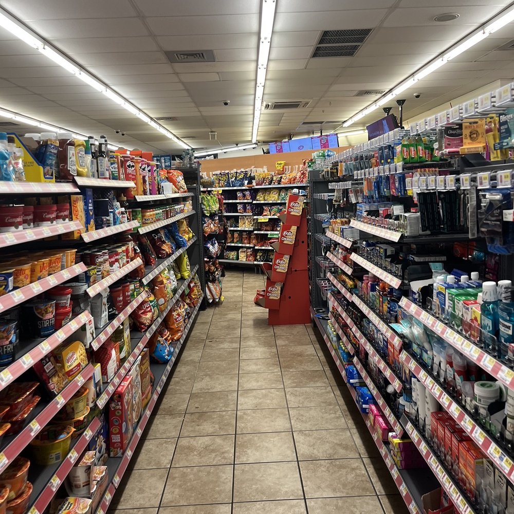 a grocery store aisle filled with products a grocery store aisle filled with products