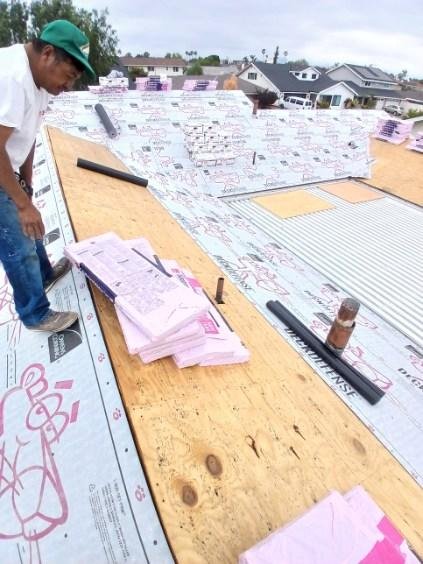 Slide of Reliance Roofing