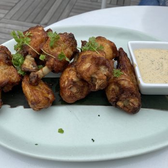 The Dewberry Charleston - Chicken lollipops - Cocktail Bars Near Me - Charleston, South Carolina The Dewberry Charleston - Chicken lollipops - Cocktail Bars Near Me - Charleston, South Carolina