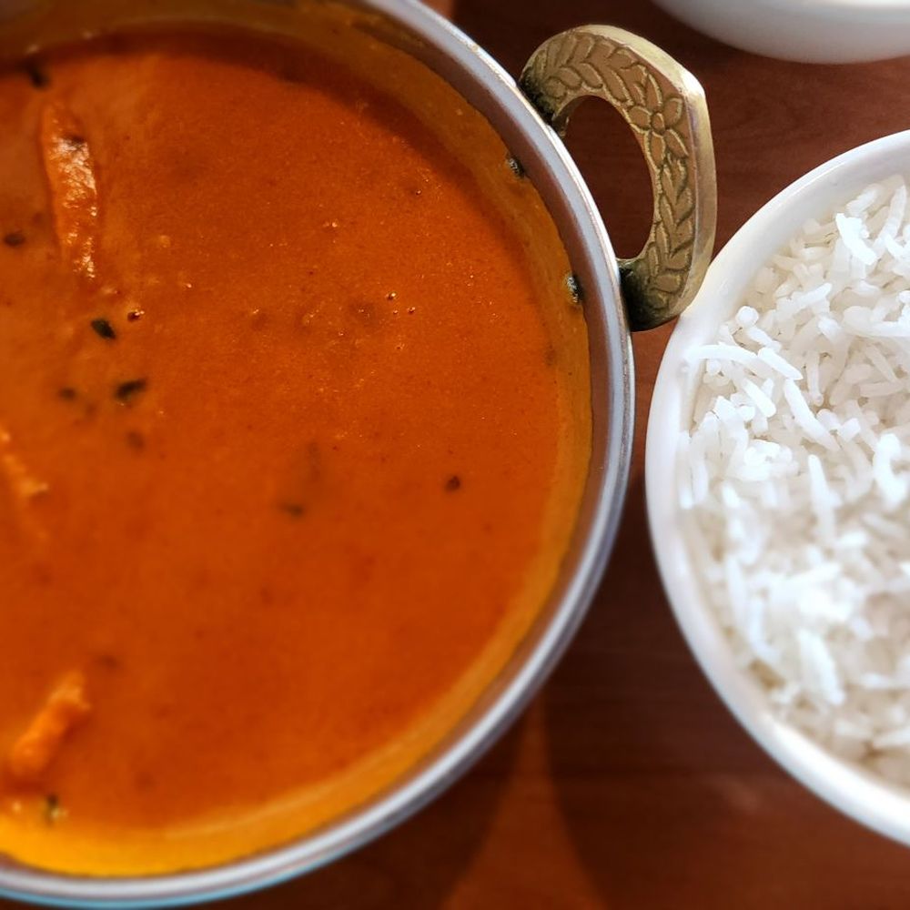 Taj Mahal - Butter chicken curry with rice - Indian Near Me - Spring Branch, Texas Taj Mahal - Butter chicken curry with rice - Indian Near Me - Spring Branch, Texas