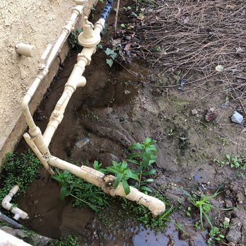 Bens Plumbing and Rooter - Pool of water that is continually being filled from the underground leak 3 months after job was completed - Plumbing Near Me