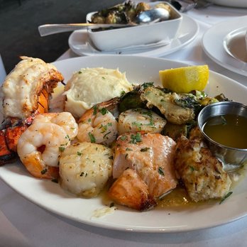 Ray's On the River - Broiled Seafood Platter with Mashed Whipped Yukon Gold Potatoes and Brussels Sprouts & Cauliflower - Seafood Near Me - Sandy Springs, Georgia Ray's On the River - Broiled Seafood Platter with Mashed Whipped Yukon Gold Potatoes and Brussels Sprouts & Cauliflower - Seafood Near Me - Sandy Springs, Georgia