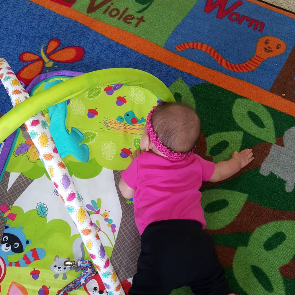 The Bear Creek KinderCare - My daughter during her tummy time. Picture sent by daycare staff when I told them I missed her. - Preschools Near Me - Houston, Texas The Bear Creek KinderCare - My daughter during her tummy time. Picture sent by daycare staff when I told them I missed her. - Preschools Near Me - Houston, Texas
