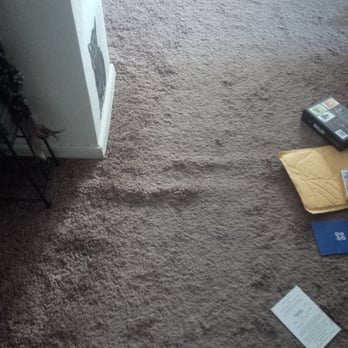 Pro Floors - lump in carpet near wall of living room - Flooring Near Me Pro Floors - lump in carpet near wall of living room - Flooring Near Me