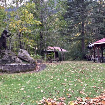 Hope River General Store - Out back view - statue, structures, early-fall conditions. - Convenience Stores Near Me - Hope, British Columbia
