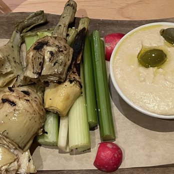 Seasons 52 - Humus appetizer with warm grilled artichokes, celery, radishes, green olives and what looked like pita bread - New American Near Me - Garden City, New York Seasons 52 - Humus appetizer with warm grilled artichokes, celery, radishes, green olives and what looked like pita bread - New American Near Me - Garden City, New York