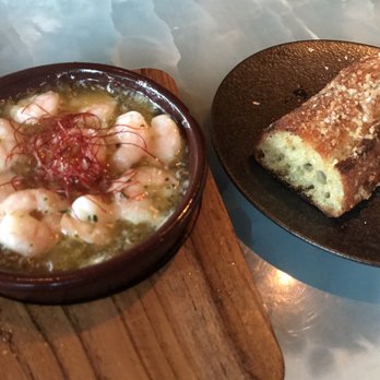 Rigo - Ajillo with garlic Parmesan bread - Spanish Near Me - Honolulu, Hawaii Rigo - Ajillo with garlic Parmesan bread - Spanish Near Me - Honolulu, Hawaii
