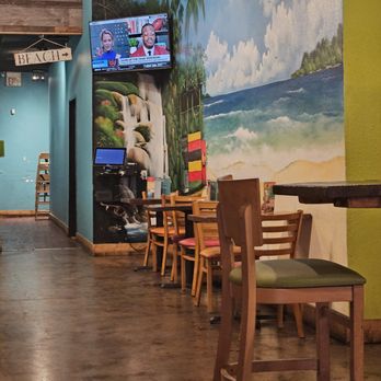 The Island Spot - a restaurant with tables and chairs - Caribbean Near Me - Carrollton, Texas The Island Spot - a restaurant with tables and chairs - Caribbean Near Me - Carrollton, Texas