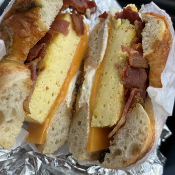 Crieve Hall Bagel - Jalapeño cheddar bagel with plain schmear, cheddar cheese, egg, and bacon. - Bagels Near Me - Nashville, Tennessee Crieve Hall Bagel - Jalapeño cheddar bagel with plain schmear, cheddar cheese, egg, and bacon. - Bagels Near Me - Nashville, Tennessee