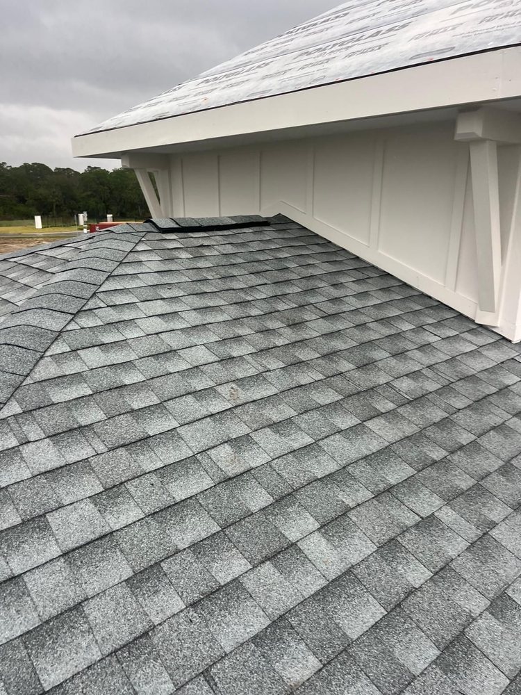 Slide of Amen Roofing Group