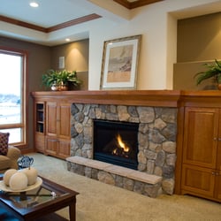 Condor Fireplace & Stone - Boulder Creek Eastern Fieldstone - Walden with a Heat-N-Glo Fireplace.