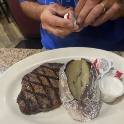 Andy's Pizza & Steak House - Hamburger steak, potato and salad with Texas toast