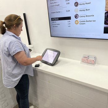 Crumbl - Olive Branch - a woman using a tablet computer - Bakeries Near Me - Olive Branch, Mississippi Crumbl - Olive Branch - a woman using a tablet computer - Bakeries Near Me - Olive Branch, Mississippi