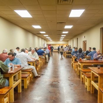 Kick Back Ranch & Event Center - Our dining hall accommodates 96 seating on handmade wood tables and benches. - Venues & Event Spaces Near Me - Ramer, Alabama