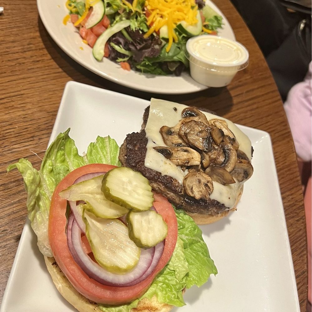 The Burger Place - Swiss and Mushrooms Burger with a Side Salad - Burgers Near Me - Atlanta, Georgia The Burger Place - Swiss and Mushrooms Burger with a Side Salad - Burgers Near Me - Atlanta, Georgia