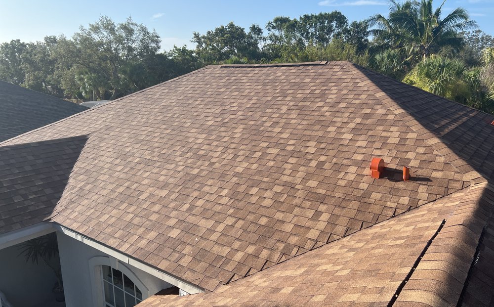 Slide of S F Roofing Quest