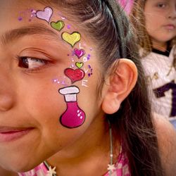 Caritas Face Painters - Love potion with hearts face paint