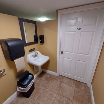 Elusive Grape - Men's restroom - Beer, Wine & Spirits Near Me - Deland, Florida Elusive Grape - Men's restroom - Beer, Wine & Spirits Near Me - Deland, Florida