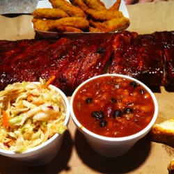 Oklahoma Joe's BBQ and Catering - Full slab of ribs with beans, slaw, and okra.