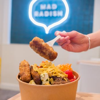 Luisa's Burritos & Bowls - a bowl of food with fried chicken, lettuce, tomatoes, and cheese - Tex-Mex Near Me - Toronto, Ontario Luisa's Burritos & Bowls - a bowl of food with fried chicken, lettuce, tomatoes, and cheese - Tex-Mex Near Me - Toronto, Ontario