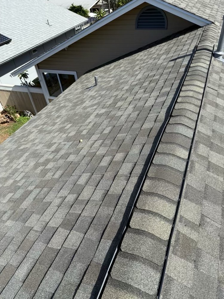 Slide of New Era Roofing