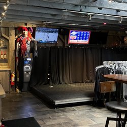 Smitty’s Hell Saloon - View of stage, t-shirt and hot sauce sales