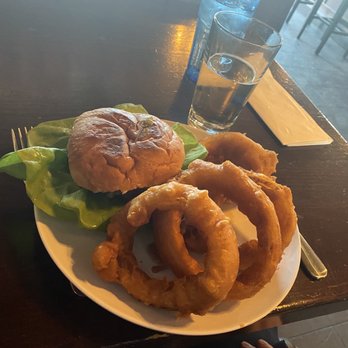 Pub 70 - Pub 70 Burger with Onion Rings - Pubs Near Me - Seattle, Washington Pub 70 - Pub 70 Burger with Onion Rings - Pubs Near Me - Seattle, Washington