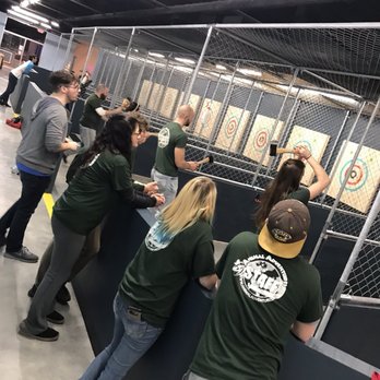 Half Axe - Action photo of the Animal Adventues team building trip to Half Axe - Axe Throwing Near Me - Marlborough, Massachusetts